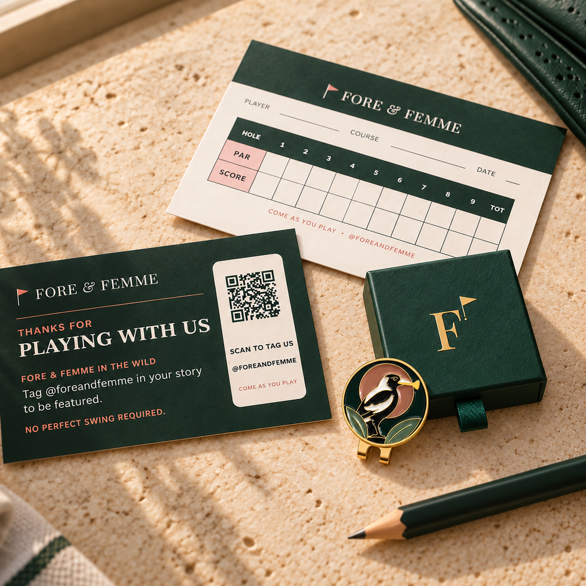 The Course Thief golf ball marker in its Fore & Femme gift box