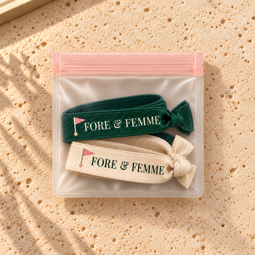 Fore & Femme Fairway Hair Ties, a forest green and cream golf hair tie duo for women