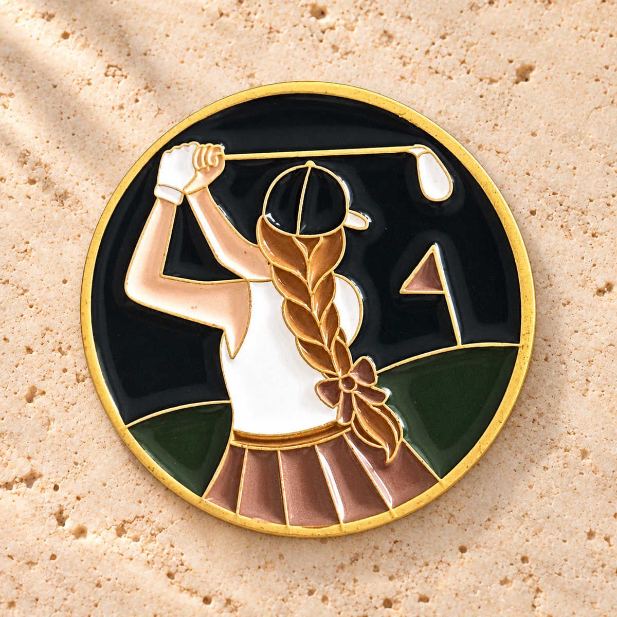 The Follow Through golf ball marker, gold-plated enamel by Fore & Femme