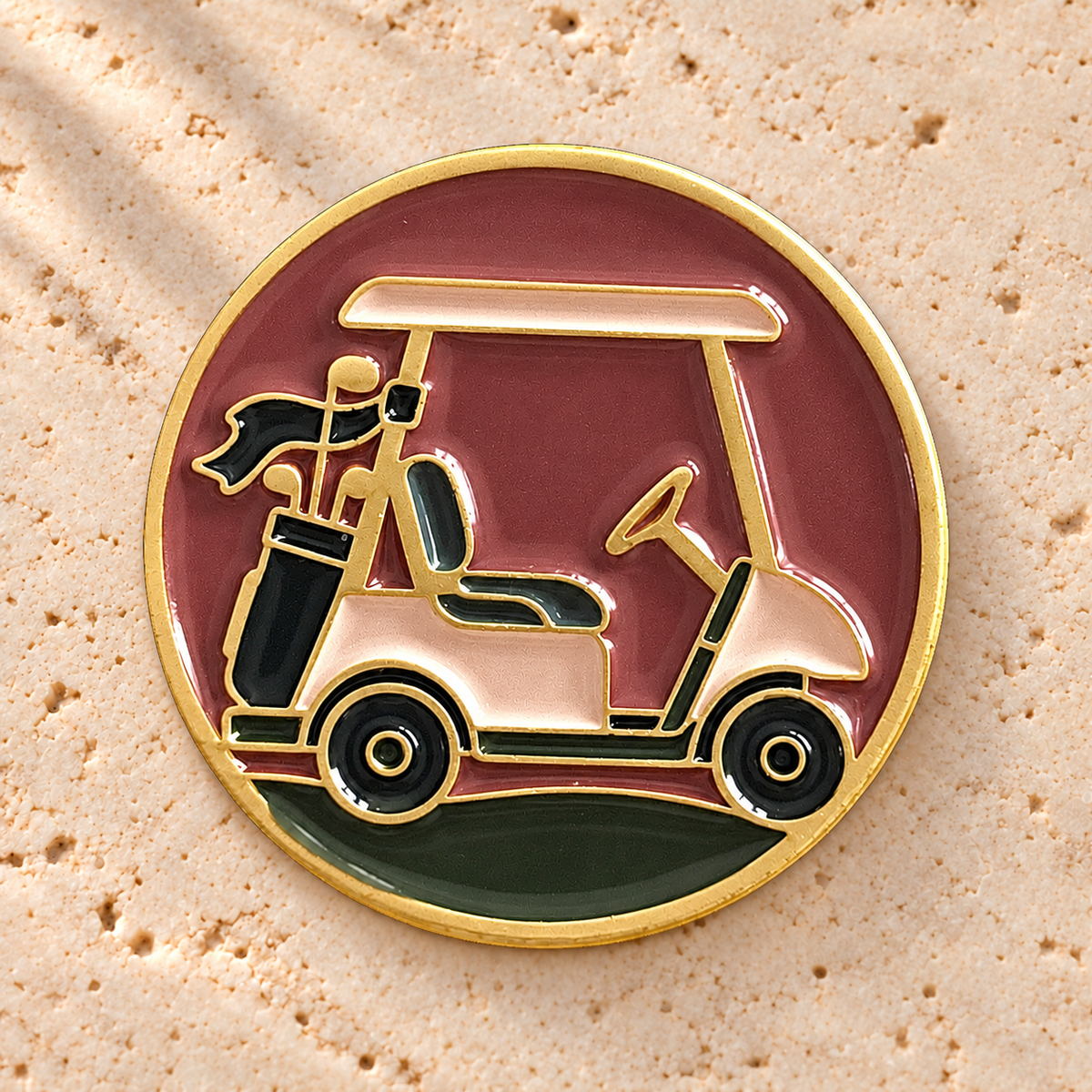 The Shortcut golf ball marker, gold-plated enamel by Fore & Femme