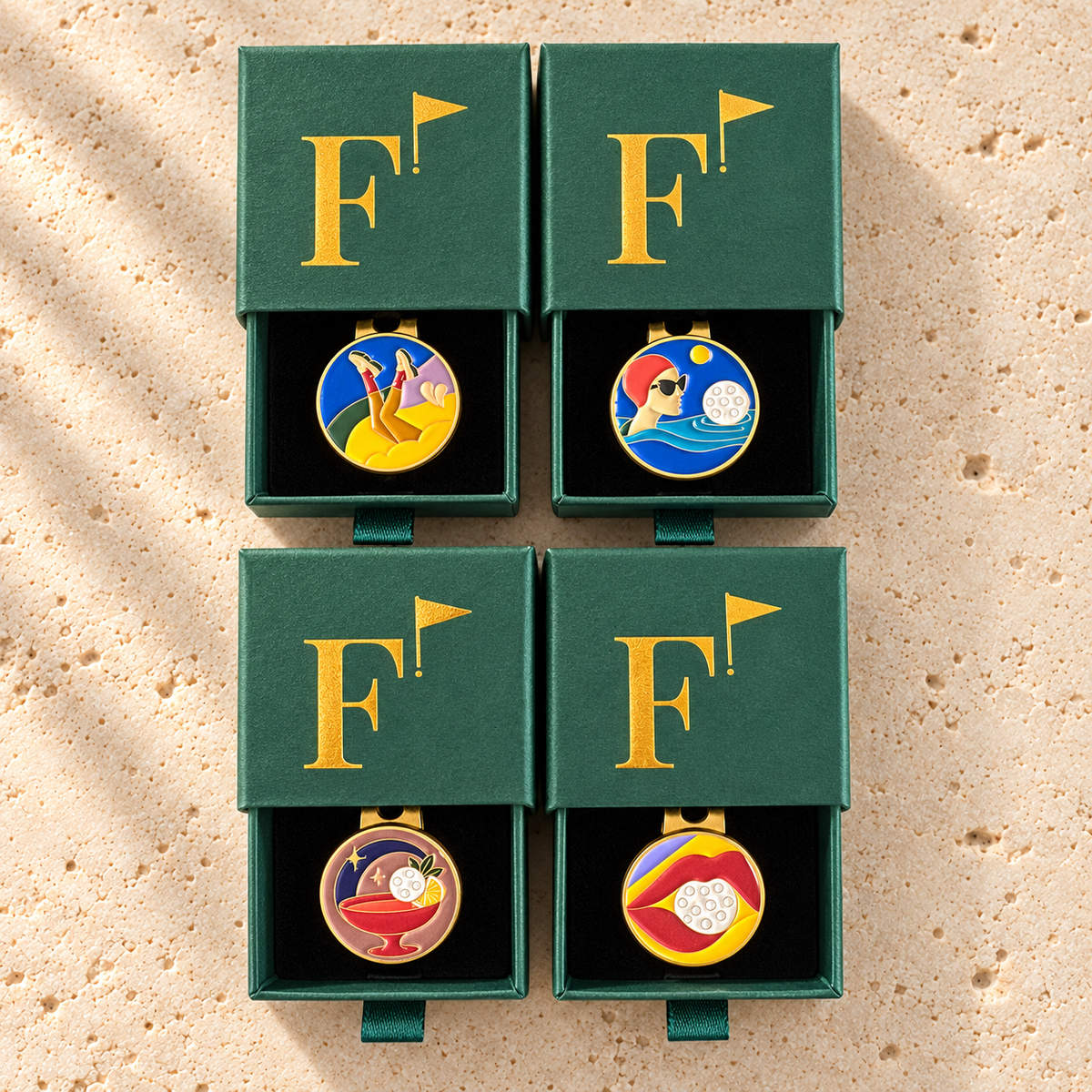 The Femmes Foursome: four Fore & Femme golf ball markers in green gift boxes